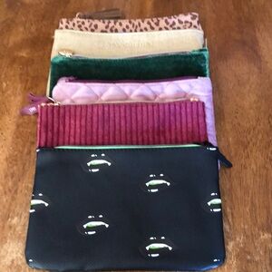 Ipsy set of 6 cosmetic bags. Never used. NWOT.